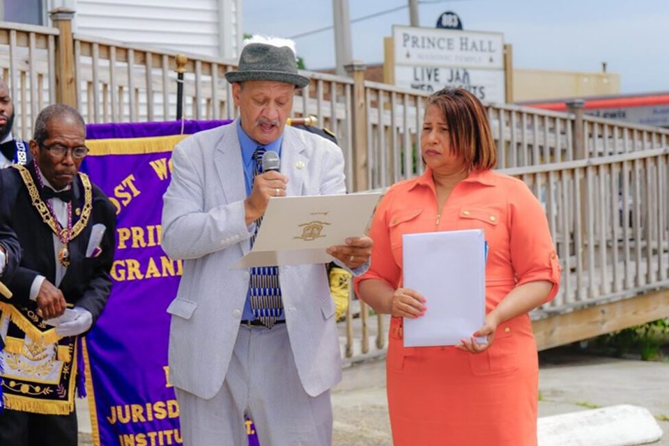 A man and woman standing next to each other.
