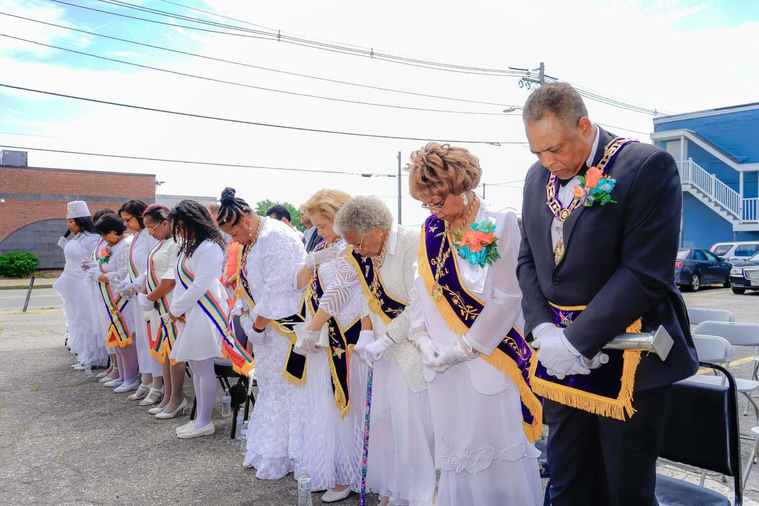 A group of people standing next to each other.