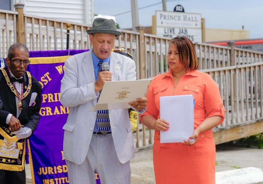 A man and woman standing next to each other.